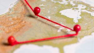 Leadership teams analyzing cross-border chemical logistics risks to protect business performance